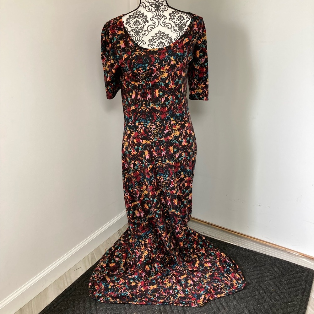 Lularoe Ana, Size M, Black background, orange, green, maroon, and blue.